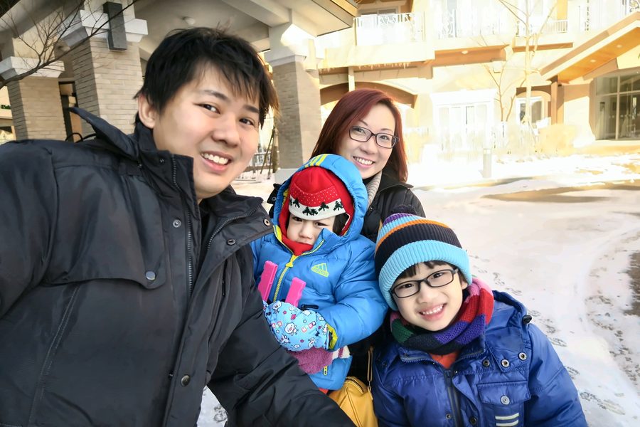 Family in the snow in Korea when the kids were small